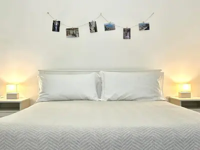 Letto o letti in una camera di Residenza Caracciolo