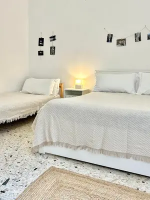 Letto o letti in una camera di Residenza Caracciolo