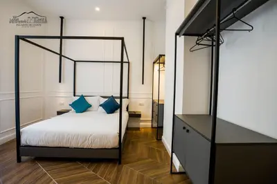 Letto o letti in una camera di Palazzo dei Conti