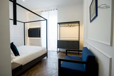 Letto o letti in una camera di Palazzo dei Conti