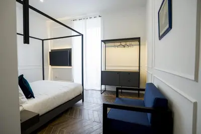Letto o letti in una camera di Palazzo dei Conti