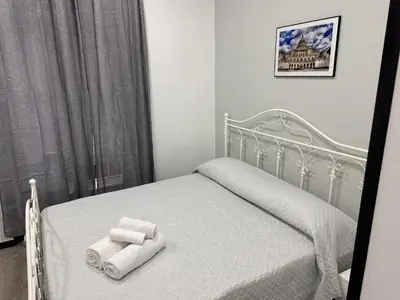 Letto o letti in una camera di le camere di anna e grazia