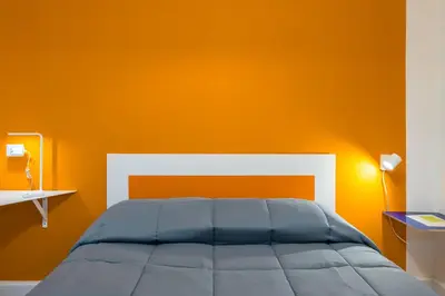 Letto o letti in una camera di Lioy 25 by Napoliapartments