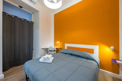 Letto o letti in una camera di Lioy 25 by Napoliapartments