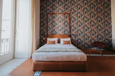 Letto o letti in una camera di Palazzo Pandola - Luxury Suites