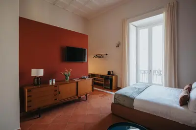 Letto o letti in una camera di Palazzo Pandola - Luxury Suites