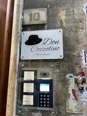 Certificato, attestato, insegna o altro documento esposto da Don Cozzolino Apartment