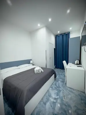 Letto o letti in una camera di MARVIT CENTRAL LUXURY