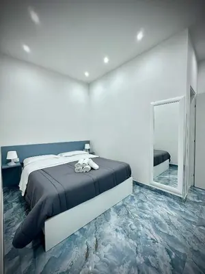 Letto o letti in una camera di MARVIT CENTRAL LUXURY