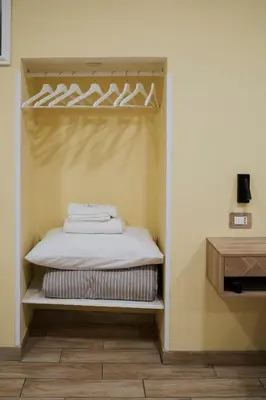 Letto o letti in una camera di Casa De Curtis