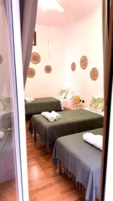 Letto o letti in una camera di Grande & Favoloso vicino il Museo Madre