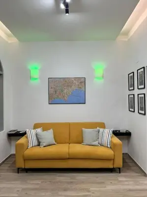 Area soggiorno di Federico II Apartment