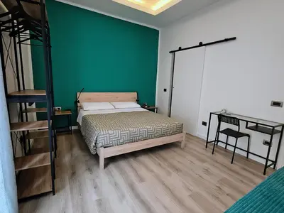Letto o letti in una camera di Bella mbriana