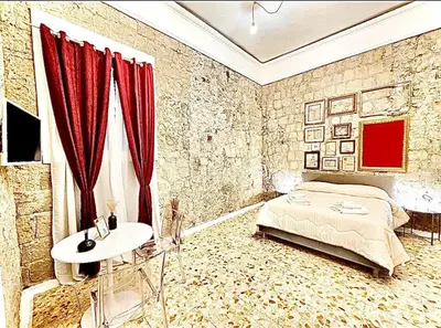 Letto o letti in una camera di La Dimora di Mary