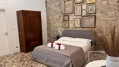 Letto o letti in una camera di La Suite di Marco