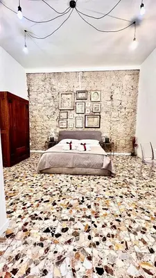 Letto o letti in una camera di La Suite di Marco