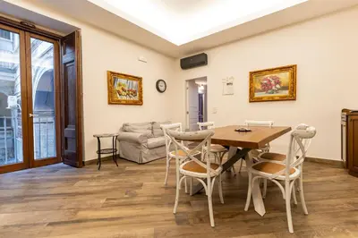 Area soggiorno di Plebiscito Rooms