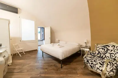 Letto o letti in una camera di Plebiscito Rooms