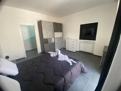 Letto o letti in una camera di La dimora del porto