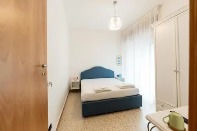 Letto o letti in una camera di Tombolata