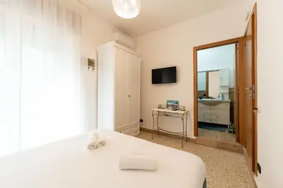 Letto o letti in una camera di Tombolata