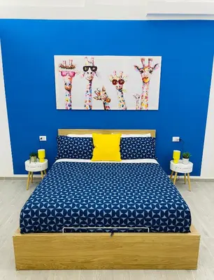 Letto o letti in una camera di Napoli Centro Casa Vacanza