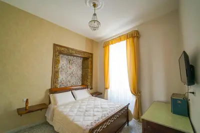 Letto o letti in una camera di 'A cas 'e Mammin