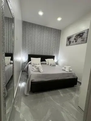 Letto o letti in una camera di Sweet House