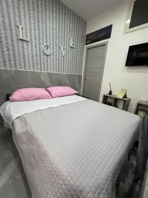 Letto o letti in una camera di Sweet House