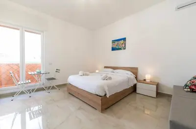 Letto o letti in una camera di Come_Visit_Napoli