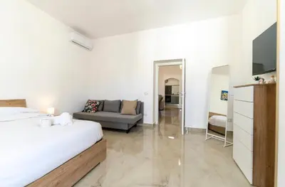 Letto o letti in una camera di Come_Visit_Napoli