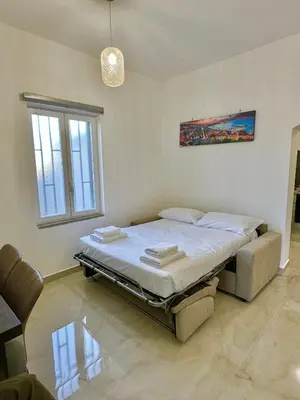 Letto o letti in una camera di Come_Visit_Napoli