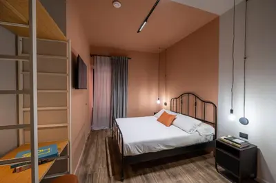 Letto o letti in una camera di RB Suites Napoli