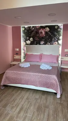 Letto o letti in una camera di Casa Gerolomini