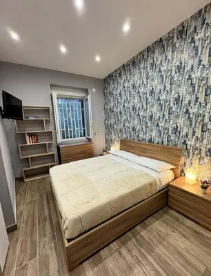 Letto o letti in una camera di 280 mt dalla metro The Mox Luxury Apartament