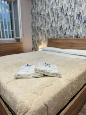 Letto o letti in una camera di 280 mt dalla metro The Mox Luxury Apartament