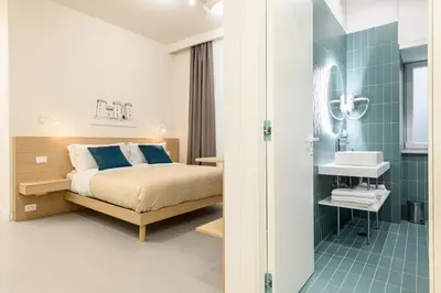 Letto o letti in una camera di Dimora Joseph VIA TOLEDO