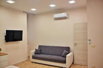 TV o dispositivi per l'intrattenimento presso La Dolce Vita Napoletana Luxury Historic Center Apartment