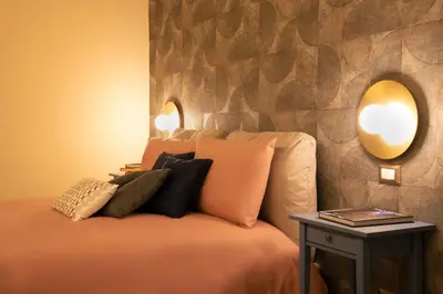 Letto o letti in una camera di NapArt