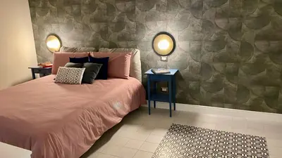 Letto o letti in una camera di NapArt