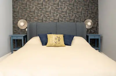 Letto o letti in una camera di NapArt