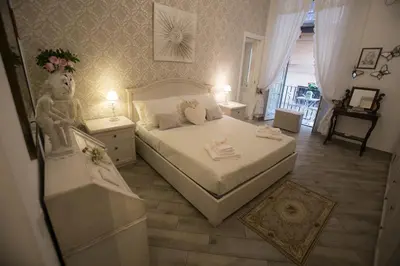 Letto o letti in una camera di La Regina di Spaccanapoli