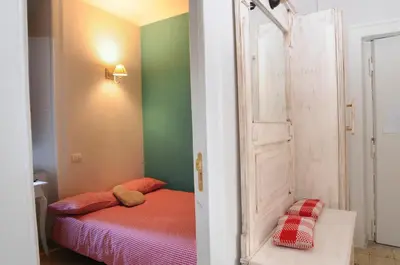 Letto o letti in una camera di Napul'art