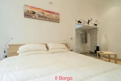 Letto o letti in una camera di Il Borgo