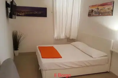 Letto o letti in una camera di Il Borgo