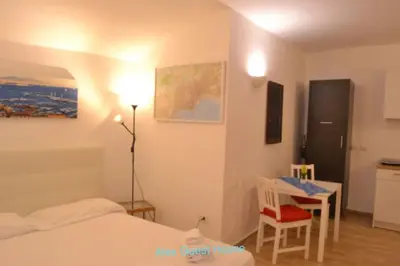 Letto o letti in una camera di Alex Guest House.