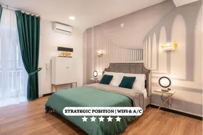 Letto o letti in una camera di The Prince Residence