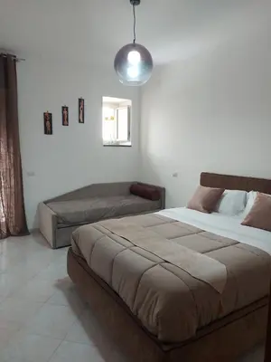 Letto o letti in una camera di Casa Genoveffa Napoli Centro
