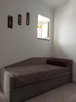 Letto o letti in una camera di Casa Genoveffa Napoli Centro