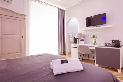 Letto o letti in una camera di B&B Palazzo Satriano